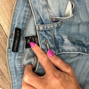 Flare jeans with ripped knee